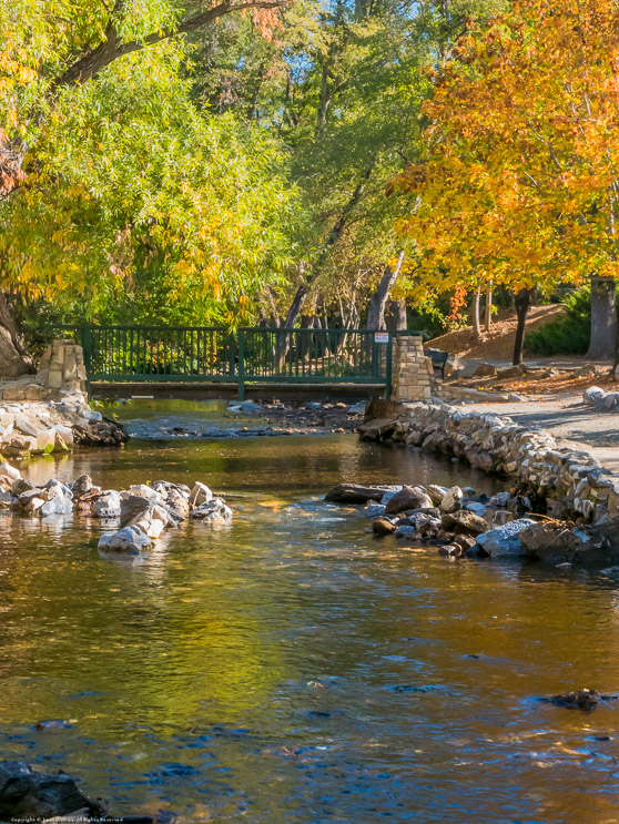 Fall Color reflections in the creek that flows through Murphys